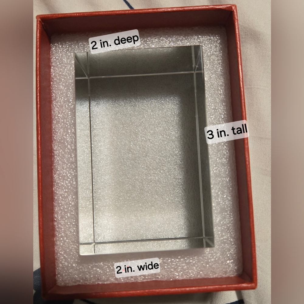 Heavy clear glass paperweight